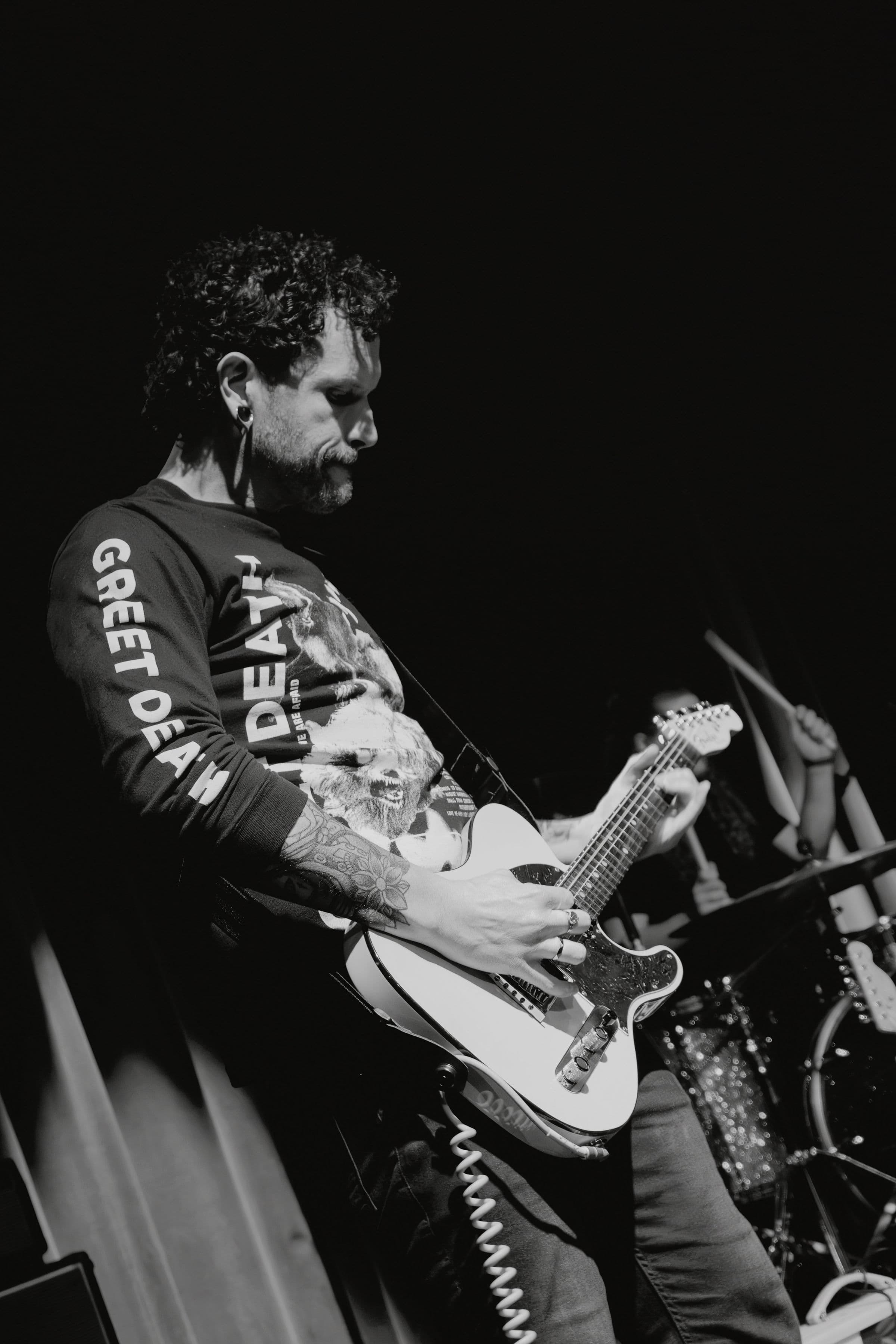 Star Witness performing live, black and white